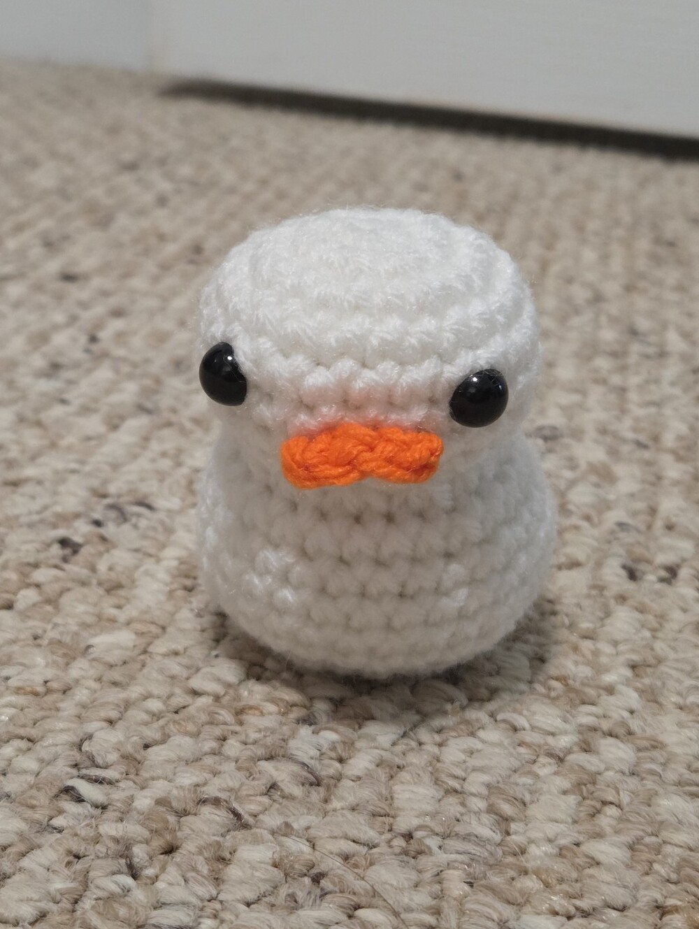 Hand Crafted White Crochet Duck with Orange Beak